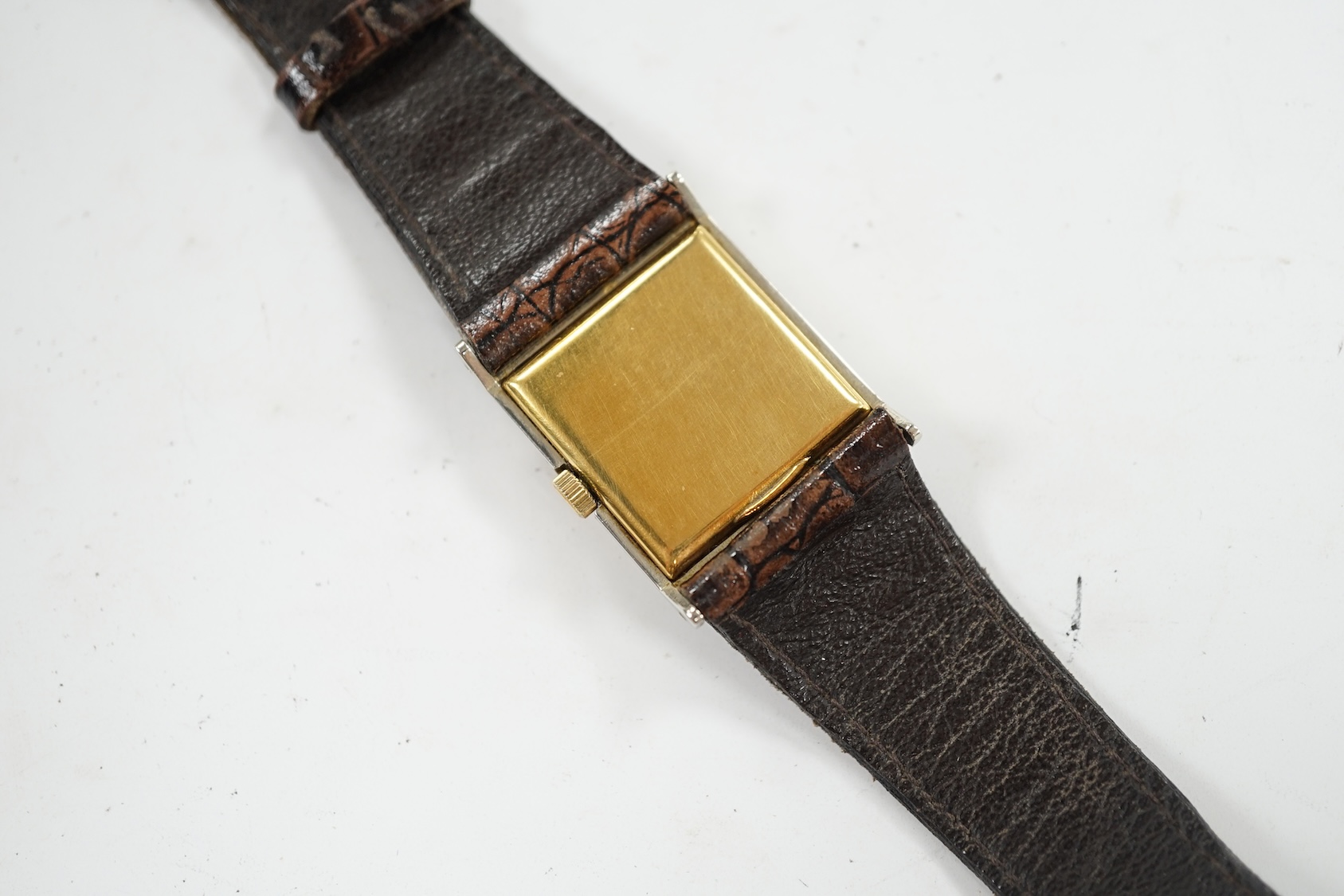 A gentleman's 18ct gold and steel Veto square case manual wind wrist watch, case diameter 26mm, on a leather strap. Condition - poor to fair